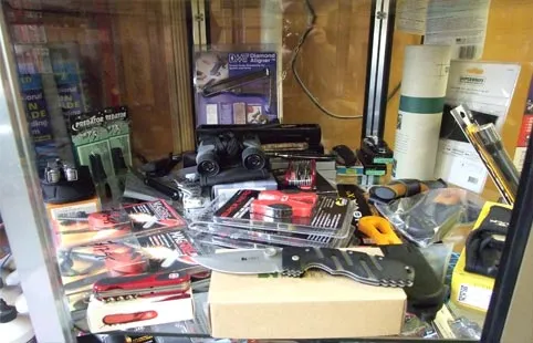 Display cabinet with ironmongery products